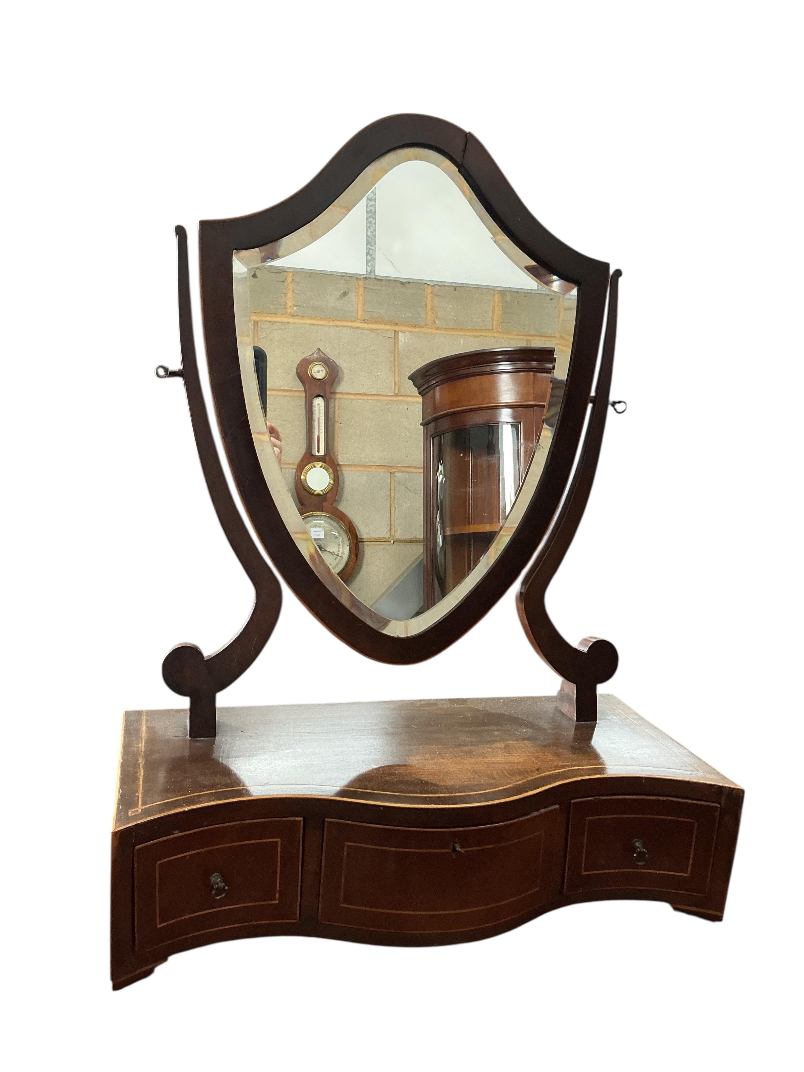 A quartetto of Edwardian rectangular mahogany tables, width 53cm, depth 36cm, height 70cm together with a George III style mahogany toilet mirror